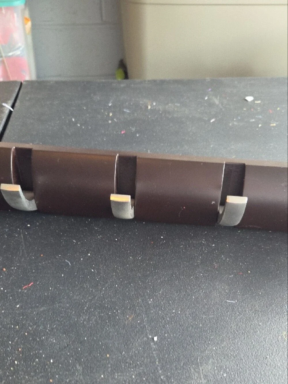 Modern Brown Wall Hook Rack with Silver Accents